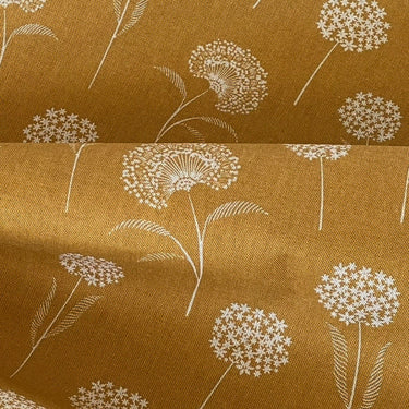 Golden mustard dandelion print linen-look fabric close-up